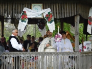 5 priest by wooden church easter in maramures